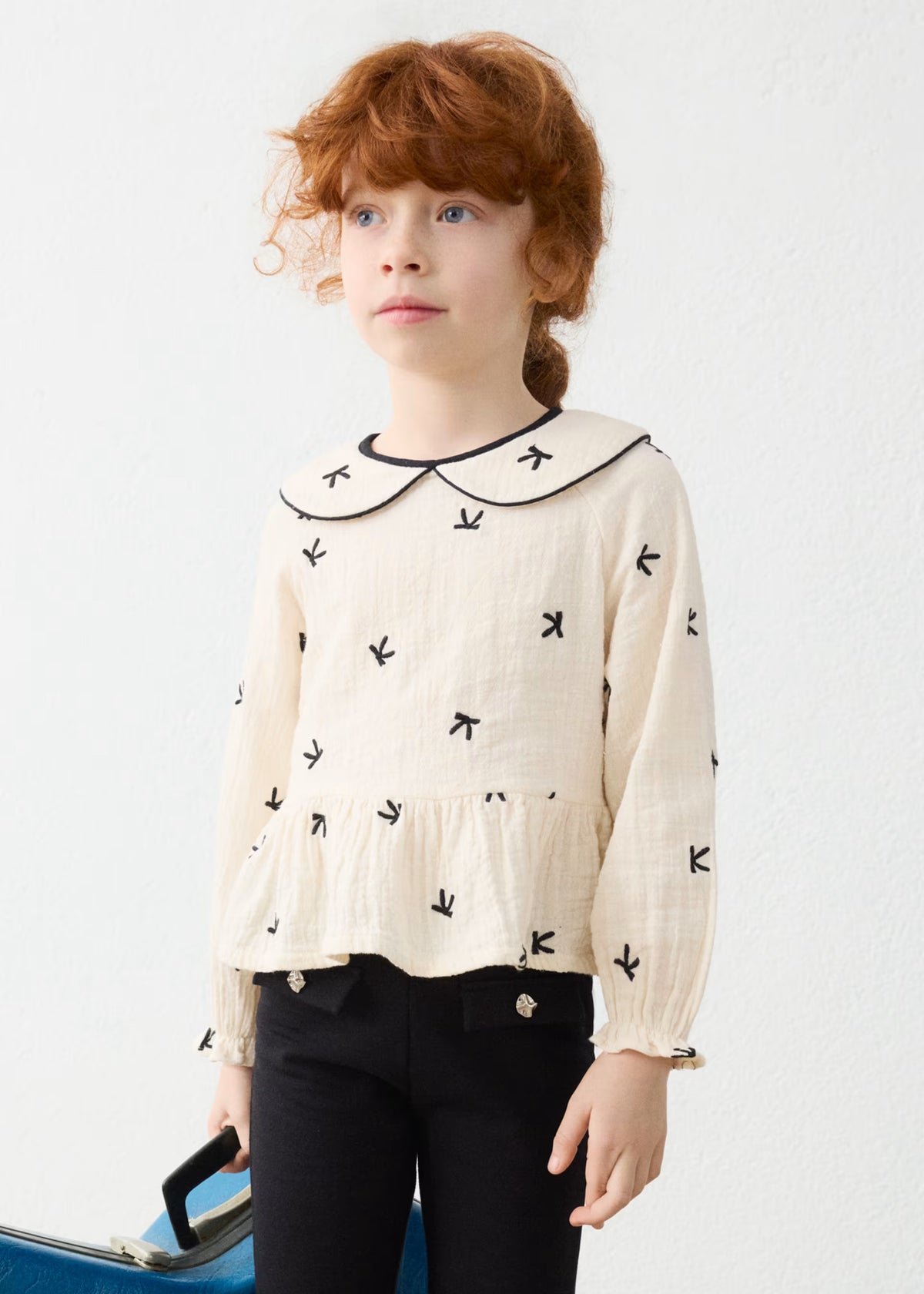 Blusa bordados lazos niña