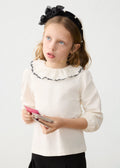 Blusa cuello volante niña