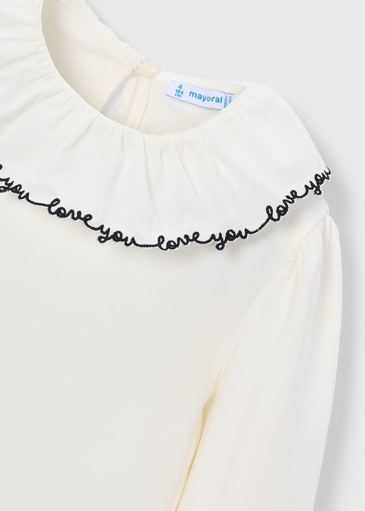 Blusa cuello volante niña